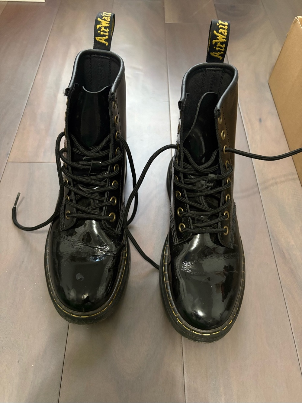 Dr. Martens Black Patent Lace-Up Ankle Boots with Yellow Stitching